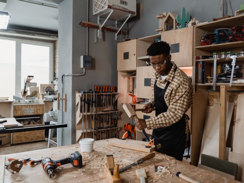 Individual working on wood project